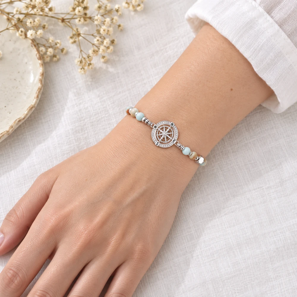 wrist white blouse — daughter beaded compass bracelet